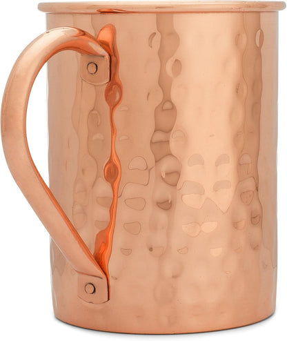 Hammered copper mug with riveted curved copper handle