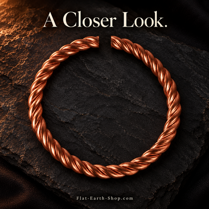 Pure Copper Tensor Bangle — Handmade Solid Copper — second view with a dark backdrop.