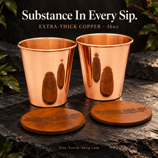 Pure Copper Tumbler — Extra-Thick 16 oz — main product view on dark slate with warm copper lighting.