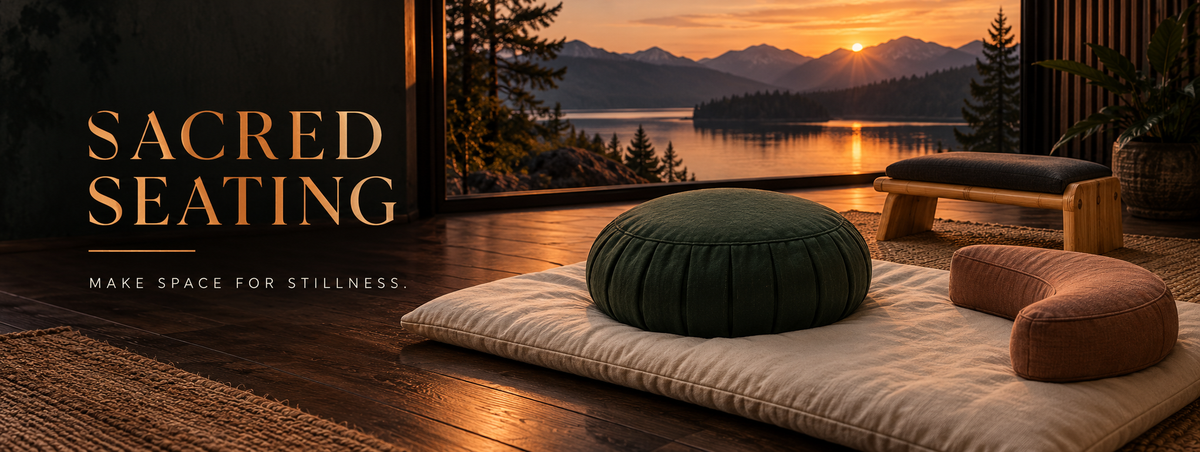 Sacred Seating — Make space for stillness. Meditation cushions and a bamboo bench in a warm room overlooking a lake at sunset.