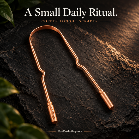 Pure Copper Tongue Scraper — main product view on dark slate with warm copper lighting.