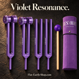 violet resonance tuning fork set in a dark studio setting